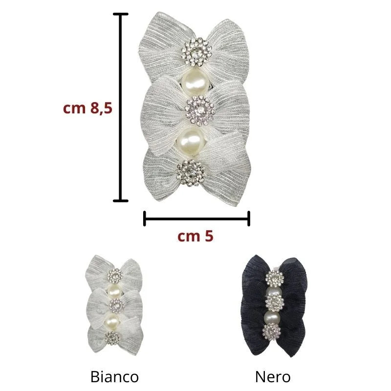 Sew-on application of organza bows with beads and rhinestones