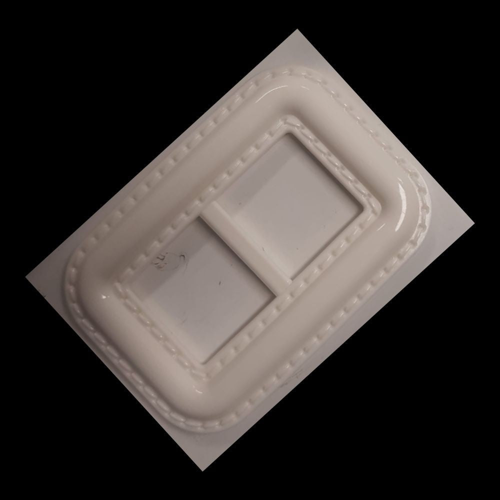 Fibbia rettangolare in plastica con finta trapuntatura h cm 4,5 l cm 6,5